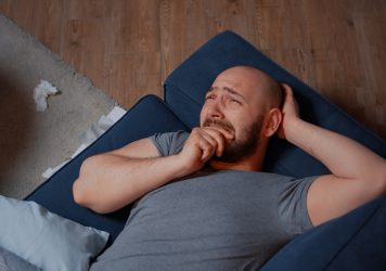 Stressed man with mental health issues feeling anxiety Stressed man with mental health issues feeling anxiety